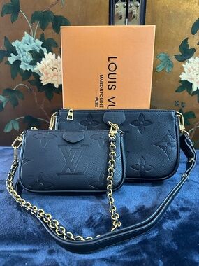 Authentic Louis Vuitton Black Empreinte Double Pochette with Gold Chain